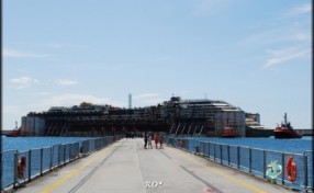 Genova-CostaConcordia-ArrivoCpncordia-PortodiVoltri-30-e1416515692194